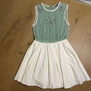 Green and white sequin dress